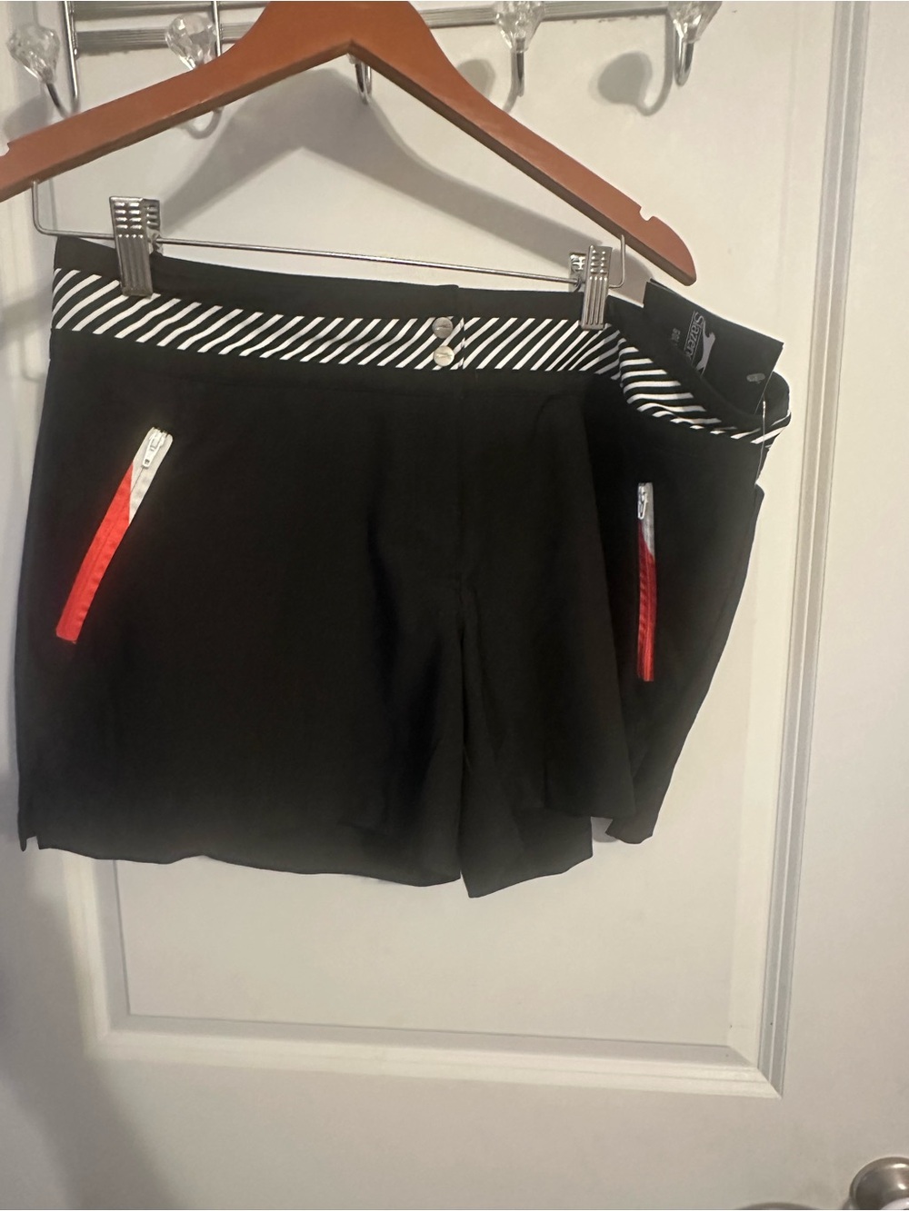 Slazenger Black Athletic Skort with Striped Waistband and Red Zip Details